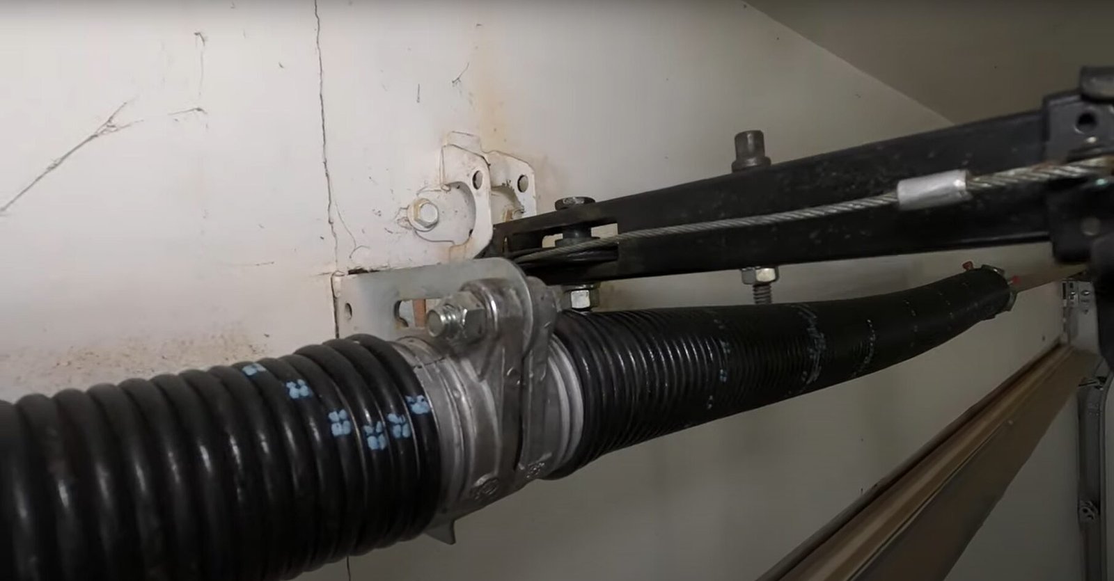Garage Door Spring Repair: How to Keep Your Door Running Smoothly